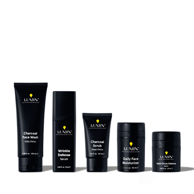 Lumin men's skincare set with Charcoal Face Wash, Wrinkle Defense Serum, Charcoal Scrub, Daily Face Moisturizer, Dark Circle Defense Balm