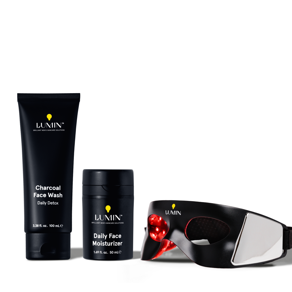 Lumin men's skincare set with charcoal face wash, daily face moisturizer, and LED light therapy mask for detox and hydration.
