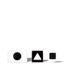 White and black geometric shape blocks with circle, triangle, and square cutouts on black background for educational use.
